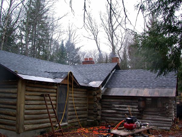 The cabin completely reshingled.