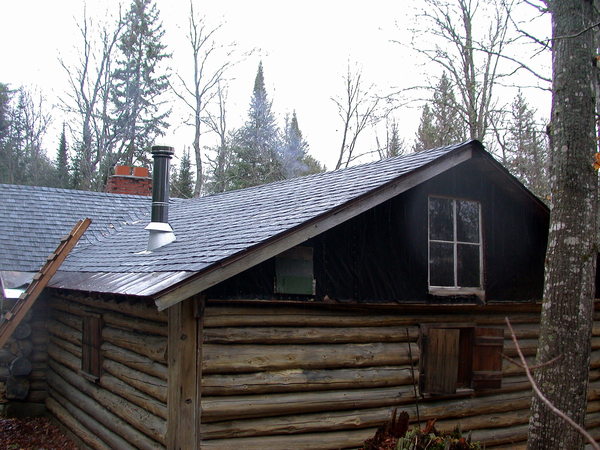 The cabin completely reshingled.