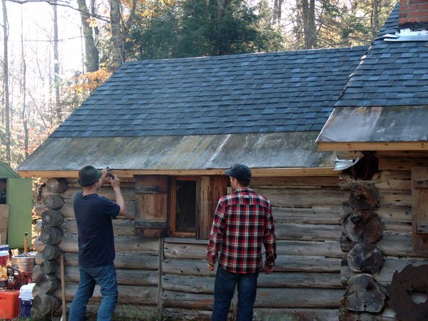 Bill and Doug finishing the work on the cabin roof.