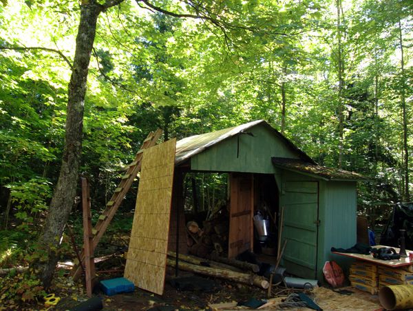 Shingles removed from wood shed.