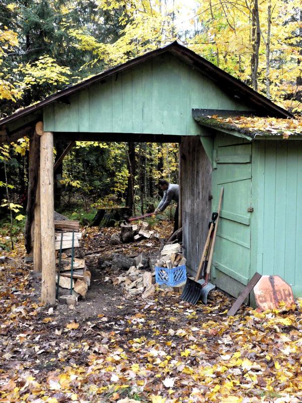 Doug splitting wood.