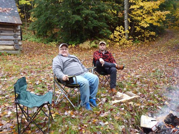 Jon and Doug sitting by the fire.