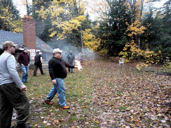 Trying to light the fire with a flaming roll of toilet paper.