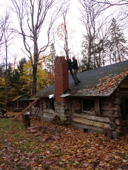 Andy and Ed pushing on the chimney.