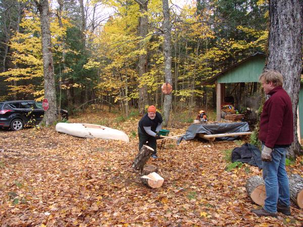 Jon splitting some hard, wet maple with Bill supervising.