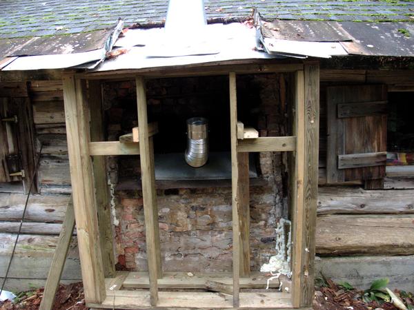 Preparation for attaching the insulated pipe to the smoke stack.