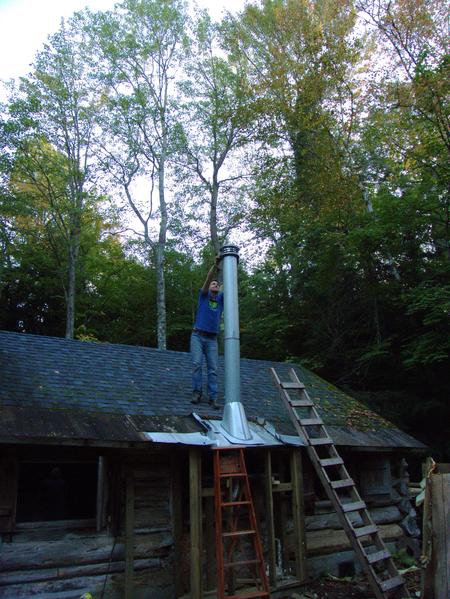 Mikey attaching the cap to the new smoke stack!