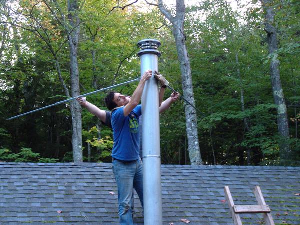 Mikey attaching the supports for the new smoke stack.