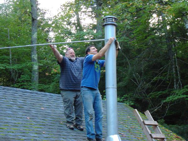 Mikey and Jon attaching the supports for the new smoke stack.