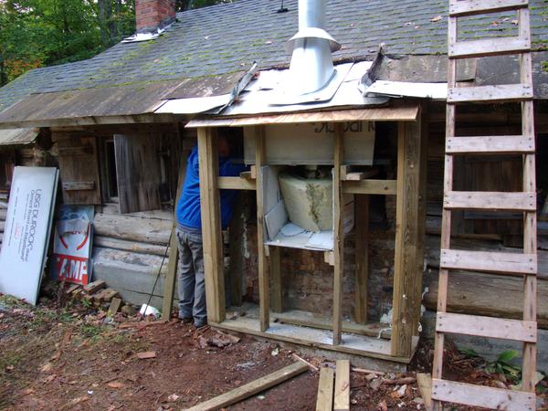 Work on insulating and closing up the box for the new smoke stack.