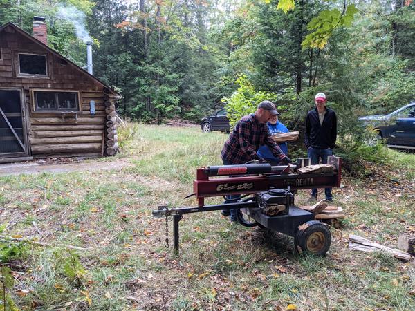 Jim, Jon, and Ed using the wood splitter.