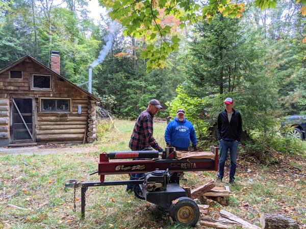 Jim, Jon, and Ed using the wood splitter.