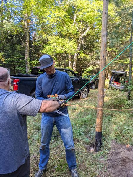 Mikey getting more rope so we can pull down "widowmaker" above the woodshed.