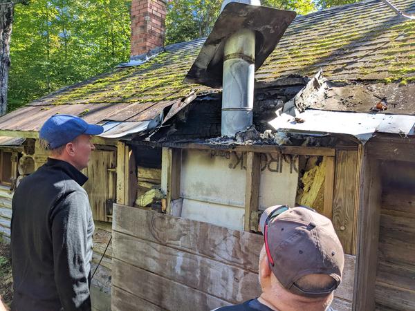 Inspecting the fire damage.