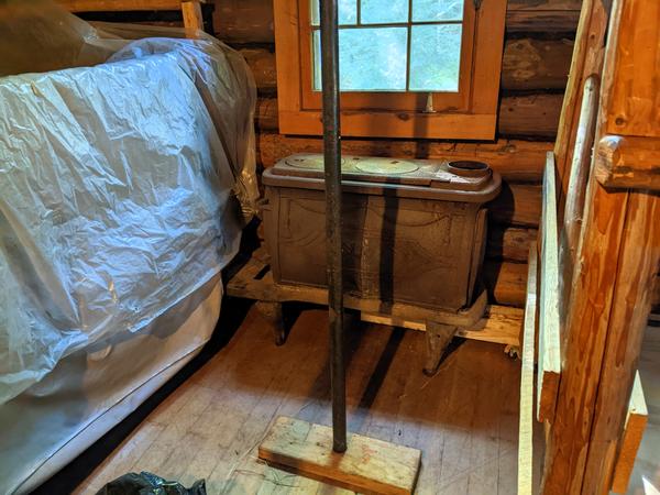 Old woodstove as a table in the bunk room.