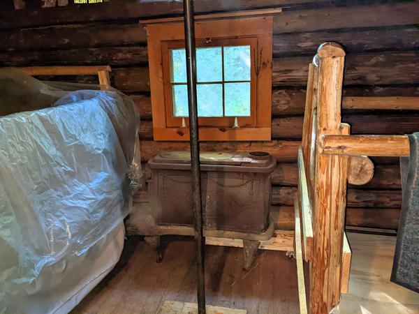 Old woodstove as a table in the bunk room.