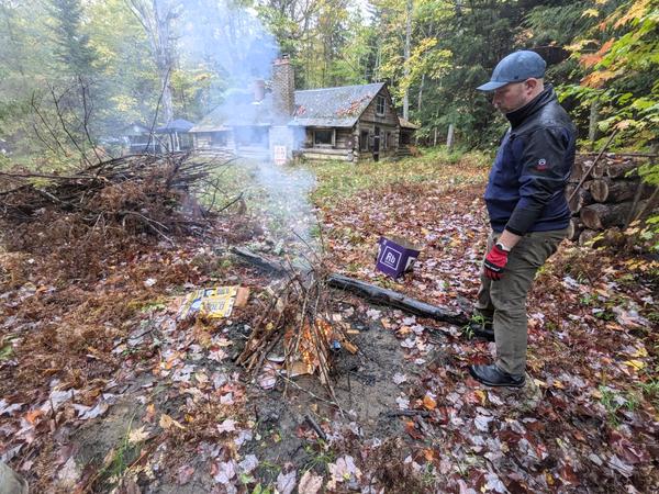Jim getting the outside fire going.