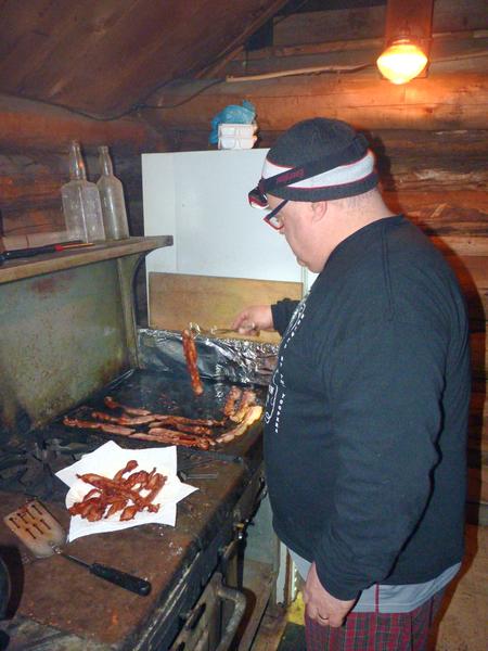 Jon making mounds of bacon as part of a typically huge breakfast.