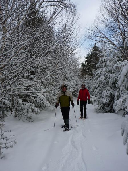 Bill and Ed snowshoeing on "the loop".