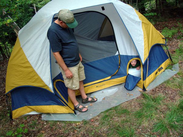 Me coaxing Frankie out of the tent.