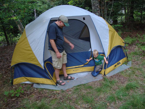 Me coaxing Frankie out of the tent.