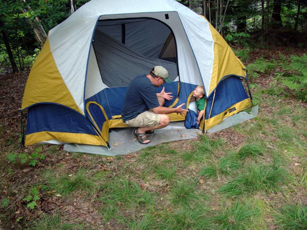 Me really coaxing Frankie out of the tent.