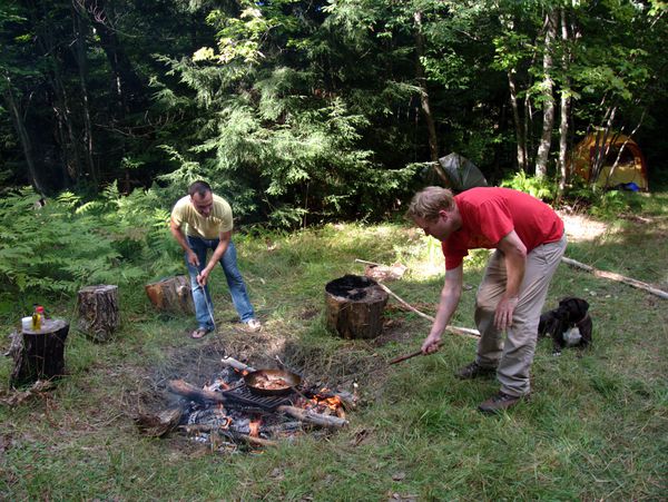 Jordan and Bill removing the pan from the fire (it was
             hot)!