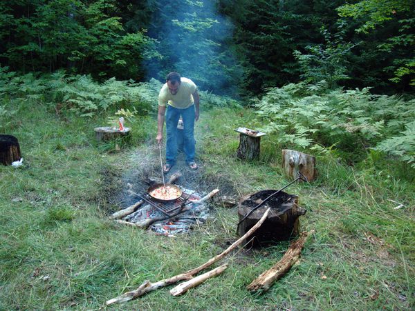 Jordan stirring the paella.