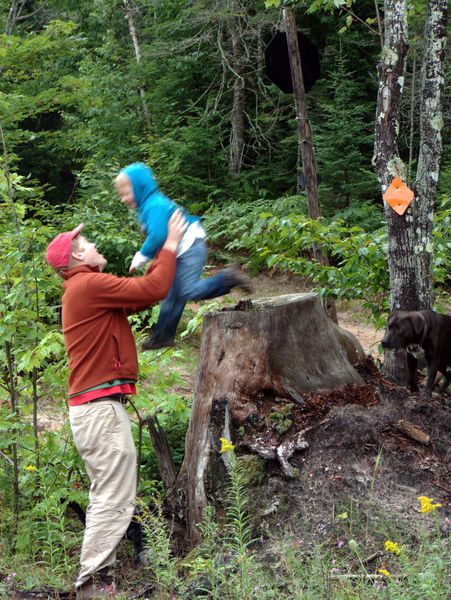 Frankie jumping off the stump to Bill.