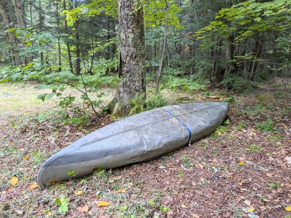 Repaired (beaten back into shape) canoe.