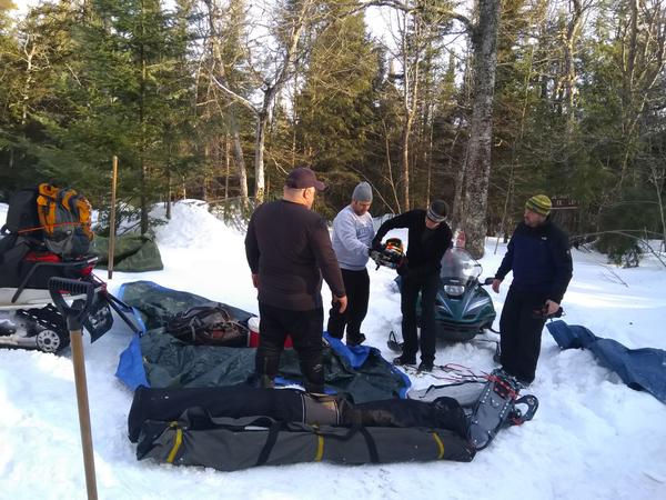 The rest of the guys packing up to leave.