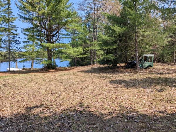 The mostly empty site along Newton Lake.