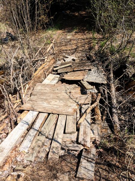 Bridge across Porter Creek on the way to the Barfield Lakes. It is in worse shape every year.