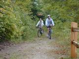 Lauren and
	  Amelia biking.